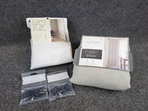 lot 161 image: Pair of NEW 84 Blackout Curtains - 1 - 50 wide Threshold Grey Linen Panel and 1 - 50 wide Project 62 Natural White Henna Panel Lot of (14) Matte Black Curtain Clip Rings
