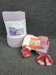 lot 175 image: NEW Twin Size Room Essentials Micro Texture Comforter in Lavender and NEW Opal House Boucle Throw with Tassel Trim