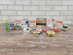 lot 324 image: Vintage Medicine Containers, Band-aid Containers, Razor and More