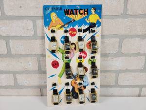 lot 4 image: 1960s Calendar Watch Display w (11) Watches - Made in Japan