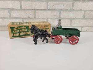 lot 26 image: Stanley Toy Co. Cast Metal Farm Wagon w Original Box
