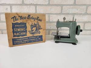 lot 34 image: Betsy Ross Miniature Sewing Machine w Original Box