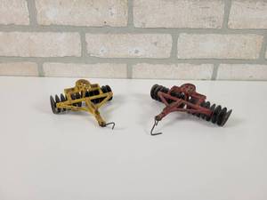 lot 41 image: (2) ARCADE Cast Iron Disc Farm Implement and Corn Binder