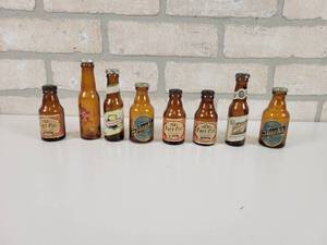 lot 45 image: (8) Mini Glass Beer Bottle Salt & Pepper Shakers - Tallest is Approx. 4.25