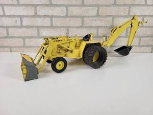 lot 62 image: Vintage ERTL Diecast Backhoe  Loader with Custom Duels - Approx. 28 Long