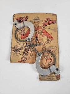 lot 68 image: Texas Dick Jr Sheriff Handcuffs w Original Packaging - Approx. 8 x 5.5