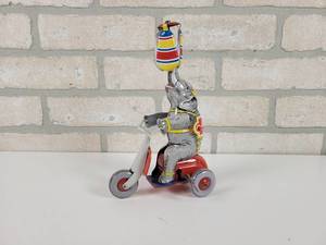 lot 73 image: Tin Wind Up Elephant on Trike Toy - Works - Reproduction - Approx. 8.5 Tall