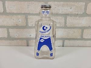 lot 75 image: Vintage Space Foods Co. Asteroid Commander Syrup Bottle - Approx. 8.5 Tall