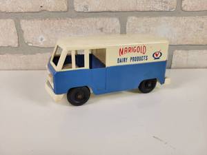 lot 79 image: Marigold Dairy Products Plastic Coin Bank Delivery Van - Approx. 7 x 3 x 3