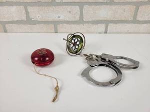 lot 117 image: Vintage Gyroscope, Duncan Yo-Yo and Toy Handcuffs