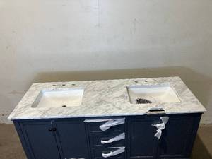 lot 86 image: Home Decorators Collection Merryfield 61 in. W x 22 in. D Bath Vanity in Dark Blue-Gray with Marble Vanity Top in Carrara White with White Basin