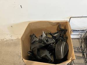 lot 93 image: Wholesale Pallet Of Ryobi Bagger Bags And Mulch Plugs.