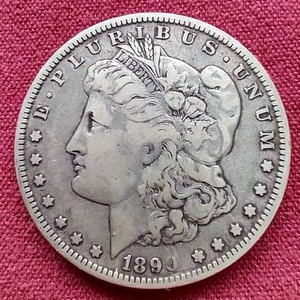 lot 1 image: 1890-O Morgan Dollar
