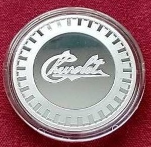 lot 21 image: Licensed Chevrolet 1 Oz. Silver Round