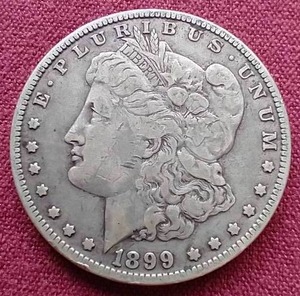 lot 51 image: 1899-O Morgan Dollar