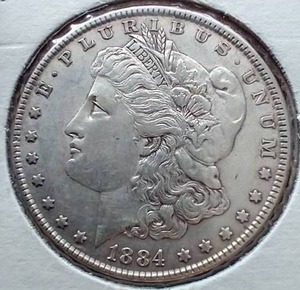 lot 57 image: 1884 Morgan Dollar