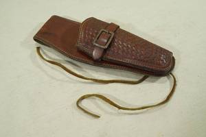 lot 92 image: George Lawrence Tooled Dark Brown Leather Handgun Holster