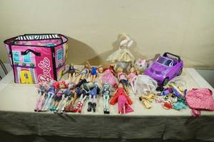 lot 26 image: Assorted Barbies and Monster High Dolls with Accessories