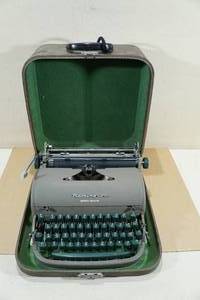 lot 134 image: Antique Remington Quiet-Riter Typewriter with Hard Case