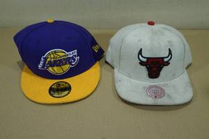 lot 215 image: LA Lakers and Chicago Bulls Snapback Hats