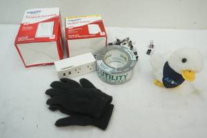lot 61 image: Surgical Dressing, Duct Tape, usb outlet extender, Aflac duck
