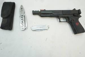 lot 166 image: marksman pellet gun, utility knife, pocket knife