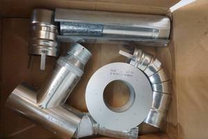 lot 243 image: tankless water heater vent kit
