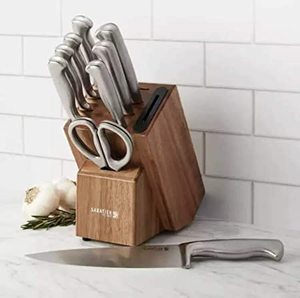 lot 551 image: Sabatier Self-Sharpening Edgekeeper 9 Piece Forged German Steel Knife Set