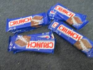 lot 297 image: 12- 1.55 oz Crunch Bars...