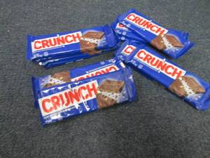 lot 298 image: 12- 1.55 oz Crunch Bars...