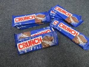 lot 299 image: 12- 1.55 oz Crunch Bars...