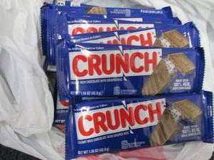 lot 372 image: 12- 1.55 oz Crunch Bars...