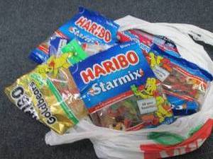 lot 377 image: 12 pks Assorted Candy...