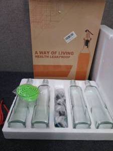 lot 53 image: Set of 4 Olive Oil Dispensers...