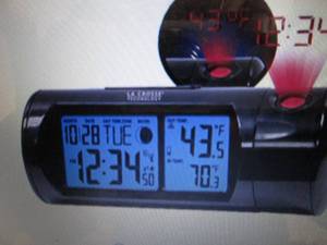 lot 174 image: Tube Projection Alarm Clock open bo...