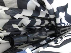 lot 204 image: Striped Patio Umbrella...