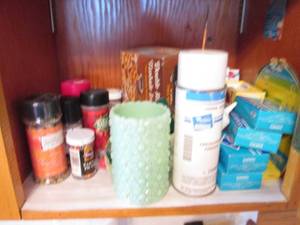 Misc. items in cupboard and on coun...