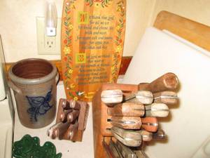 Items on countertop including cutti...