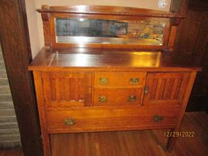 Wooden buffet 54x 21x 56 on whee...