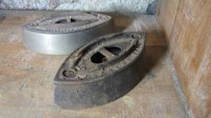 (2) antique sad irons...