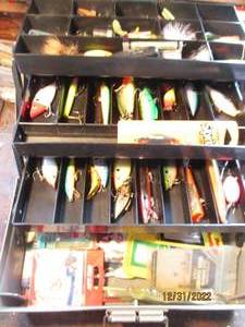 Plastic Rebel tackle box filled wit...