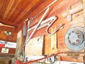 Lot of Antique tools hanging on wal...
