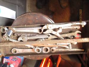 Metal toolbox tray filled with an a...