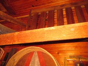 Wooden Porch swing attached to the ...