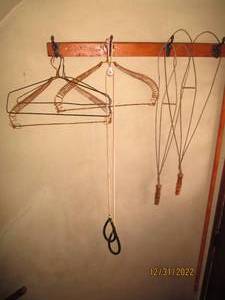 Rug Beaters and wire Hangers...