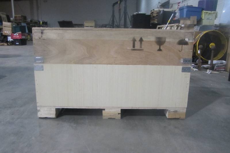 lot 21 image: Shipping Crate - 46.25 x 42 x 28 Quality built plywood Crate.  Top is removable made to last