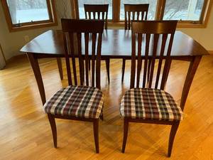 handsome dining table with leaf (as shown) and 4 upholstered chairs