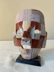 decorative face mask on base