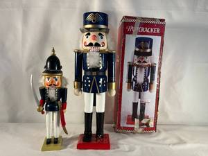 2 nutcrackers, one with box