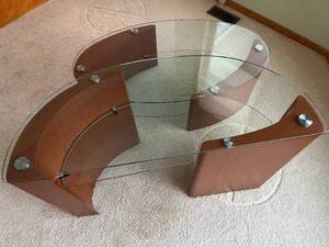 set of modern glass and wood tables